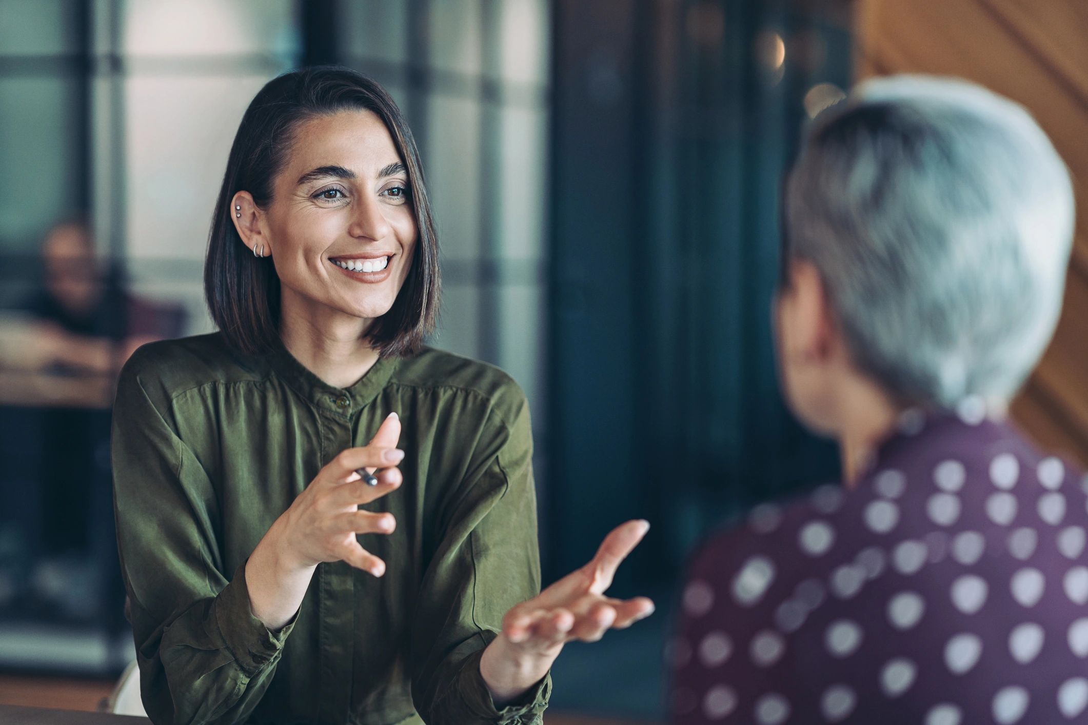 Two people in a supportive coaching conversation